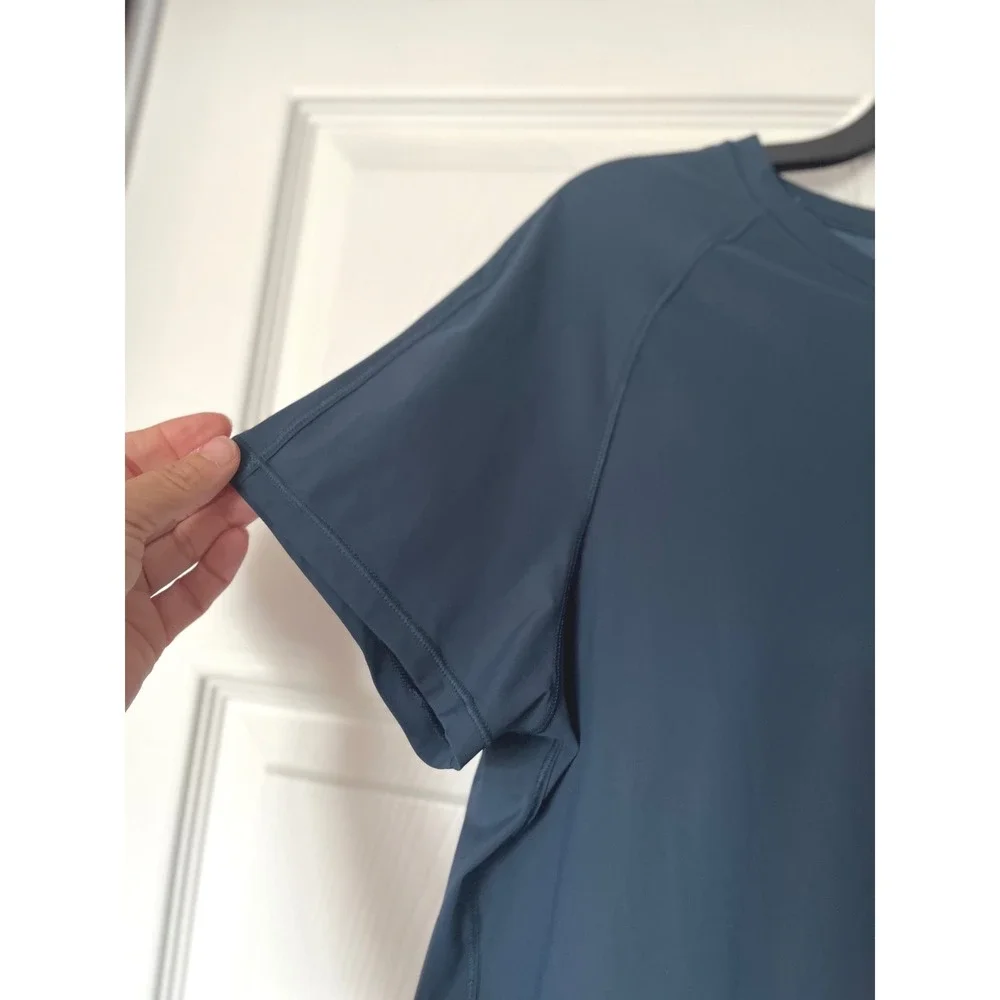 Lululemon Teal Short Sleeve Mesh Hem Crossover Tulip Back Activewear Top Womens